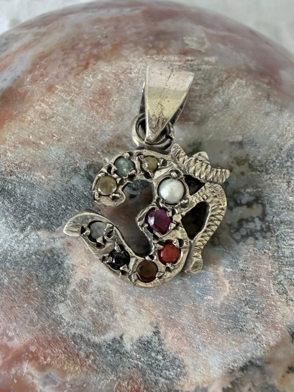 Sterling Silver Om Pendant with Semi Precious gemstones.